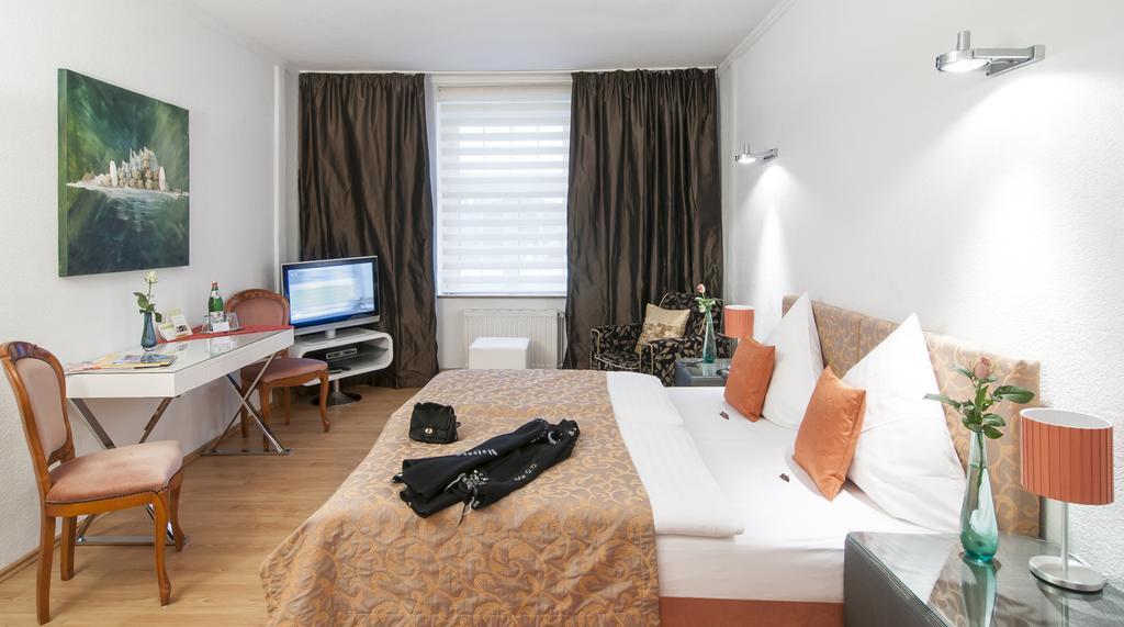 Hotel Service Apartments Am Prinzenplatz Kamp-Lintfort Quarto foto